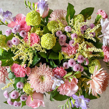 Load image into Gallery viewer, Bouquet of pink, green, and purple flowers on a neutral background
